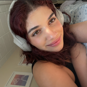 A college Student with headphones on